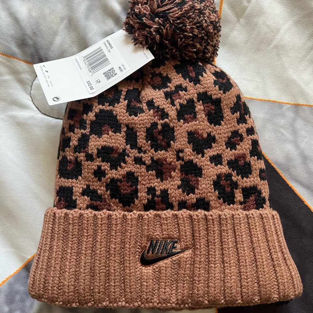 Nike Pom beanie new with tags. Fleece lined so it’s super soft and comfy!